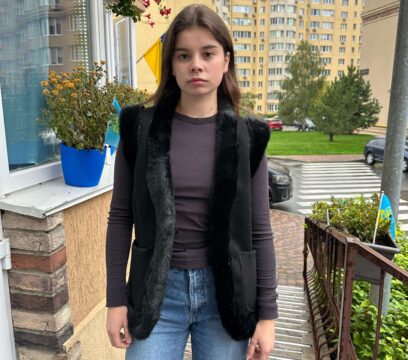 Безрукавка з овечої вовни та екозамшу (чорна)